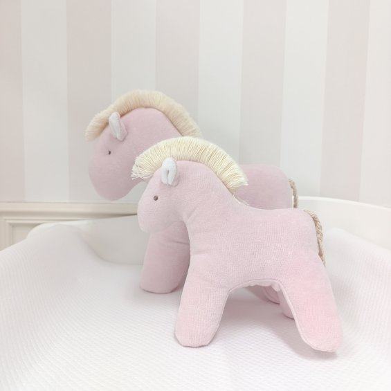 Powder pink horse