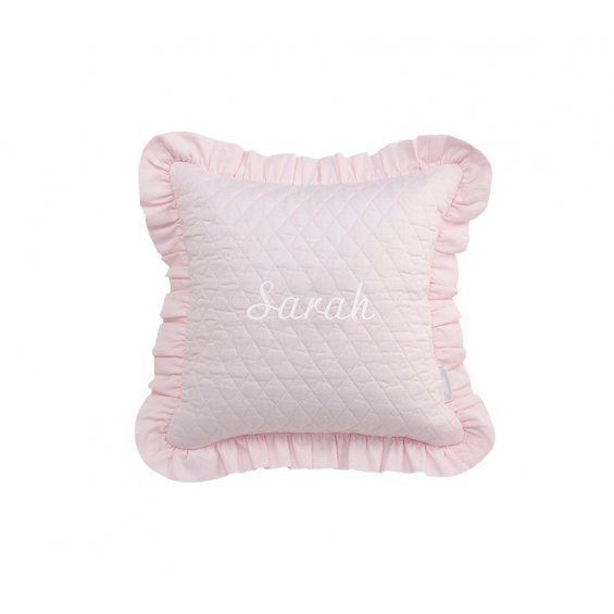 Pink pillow wiith emblem