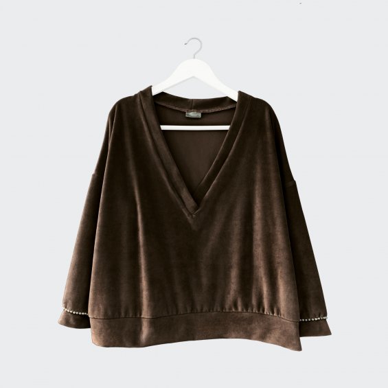 brown velour blouse with pearls on the cuffs