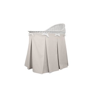 Mobile wicker bassinet with beige skirt