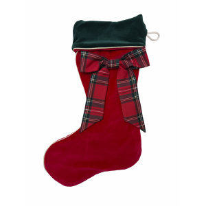Red Christmas stocking with a plaid bow